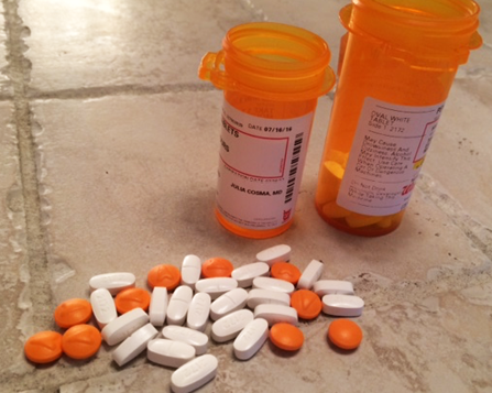 Oxycodone and aspirin from a pain sufferer’s prescription. 