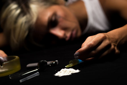 addict passed out after drug use