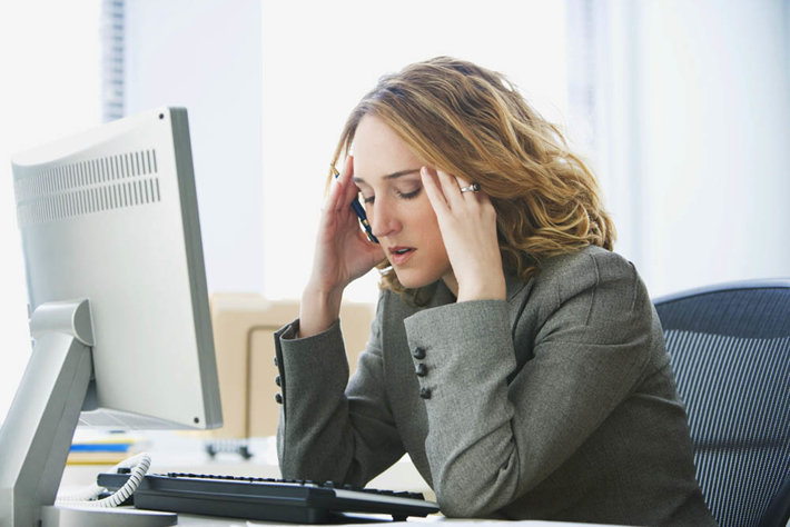 Woman executive stressed out 