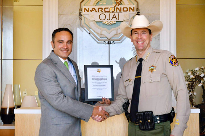 Executive Director Narconon Ojai accepts letter of appreciation from Sheriff James Fryhoff of the Ventura Sheriff’s Office.